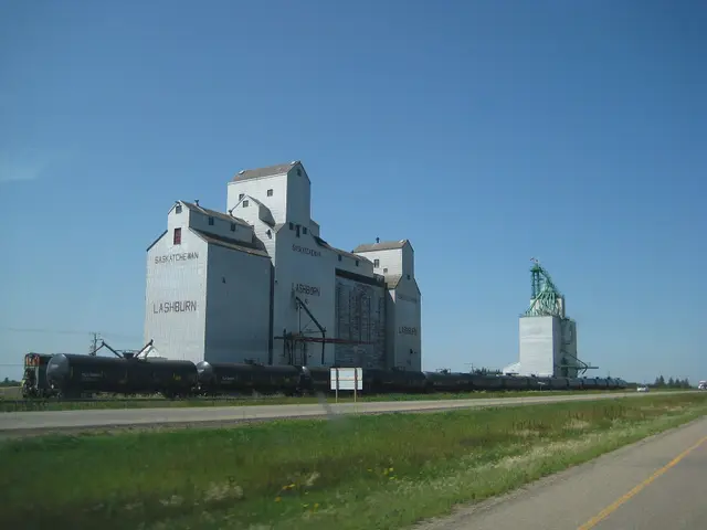 The grain elevators and tank cars